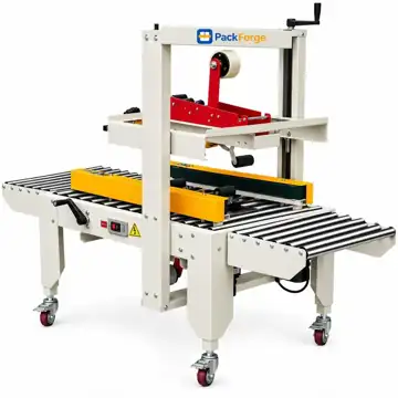 PackForge 102TU carton sealer with its red top tape head above the side drive belts